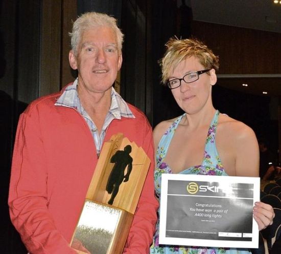 Veteran runner Mark Douglas with his Perserverance Trophy, and daughter Fleur Douglas