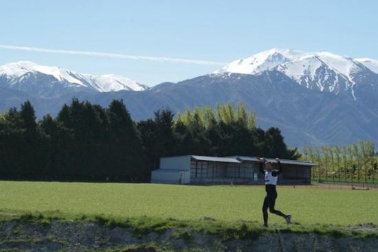 A runner enjoying the scenic 11km run leg into Methven's Blue Pub