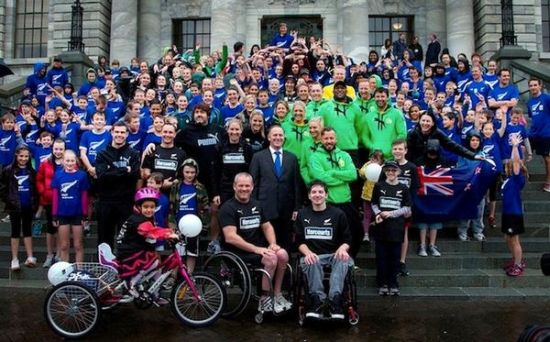 John Key with Harcourts New Zealand Team, Australian team and local school students.