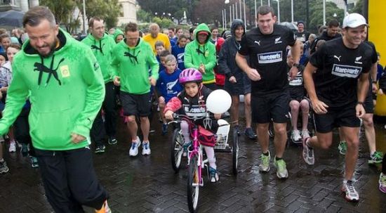 Bella Everlupi rides her Halberg Disability Sport Foundation funded trike at the start of the ANZA Challenge race with Australia and New Zealand teams.