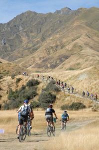 Riders exiting Aid Station 2 heading up into the Motatapu Valley