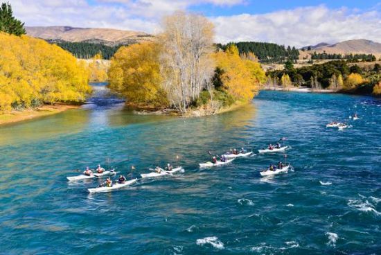 Kayakers paddling the Clutha River during the 2013 Wild Descent