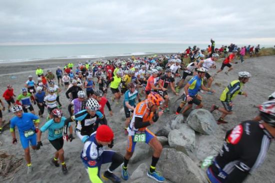 Competitors get underway in the Two Day Coast to Coast event on Kumara Beach on the South Island's West Coast
