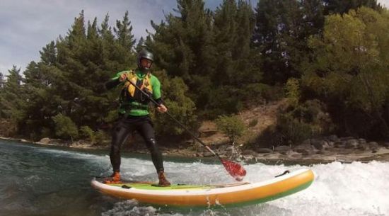 Tony Bain on a SUP on the Hawea River last year