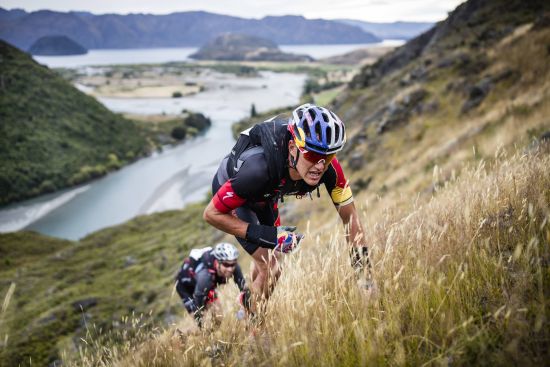 Team Red Bull, Braden Currie (front) and Josiah Middaugh hike up a steep hill at Red Bull Defiance 2017 